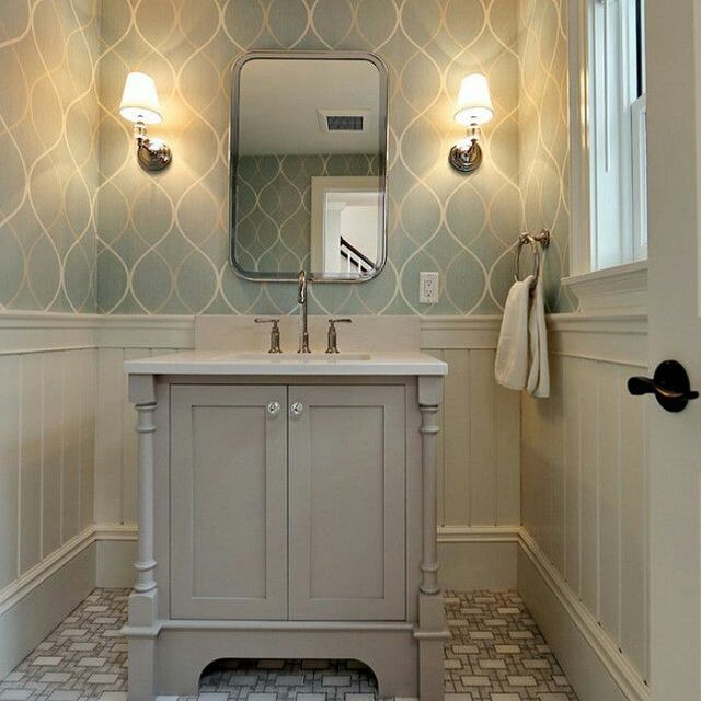 A painted and wallpaper decorated bathroom